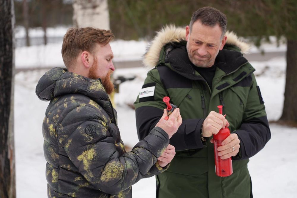 Karl Hinett and Jason Fox are pictured checking their trek equipment.