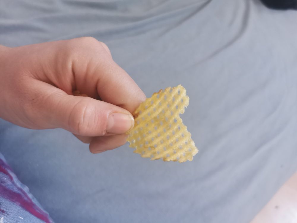 Gitter Chips in Herzform mit viel Fantasie.