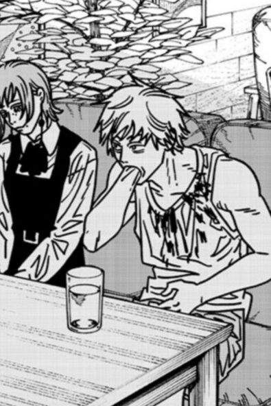 Denji chainsawman looking across a table with his hand in his mouth