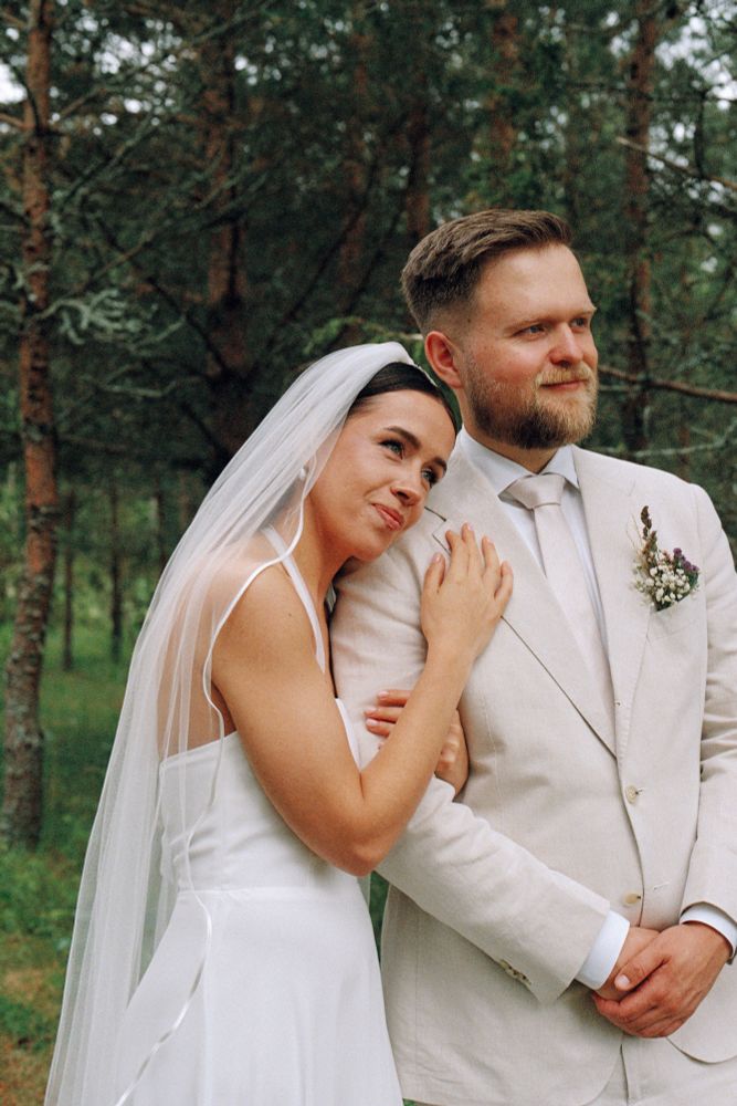 My wife and I, smartly dressed in a pine forest 