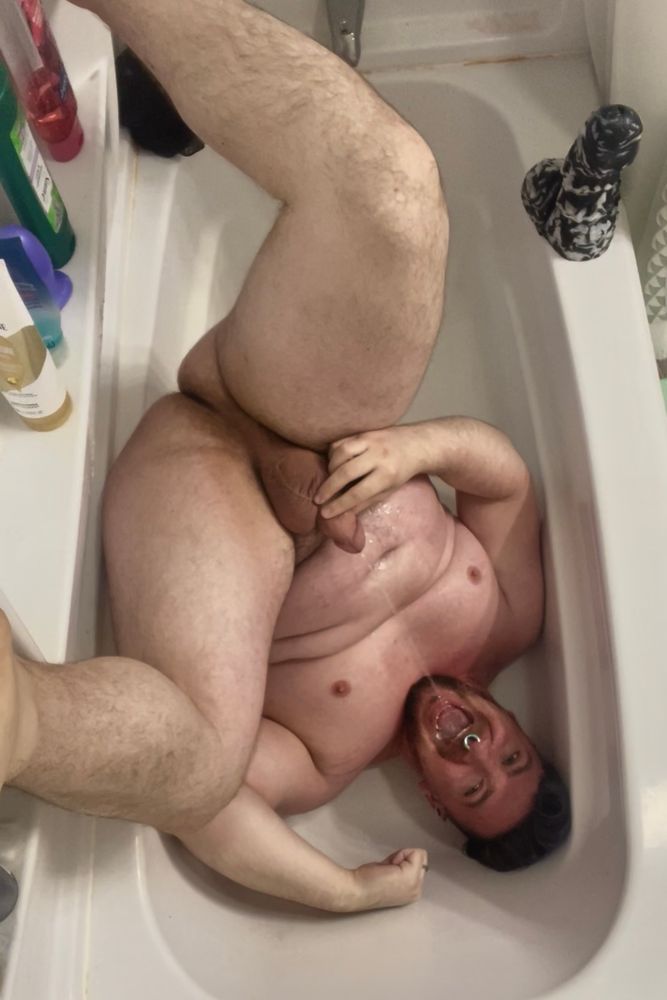 Pissing all over myself in the tub