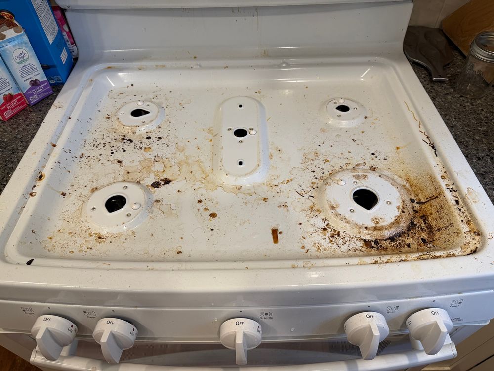 A really dirty, greasy stovetop.