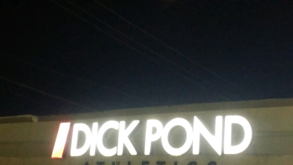 Neon sign that reads Dick Pond