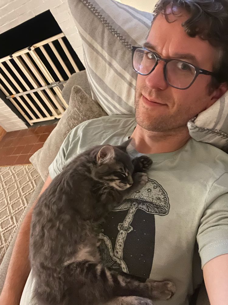 Bruno napping on my chest during my work break. 