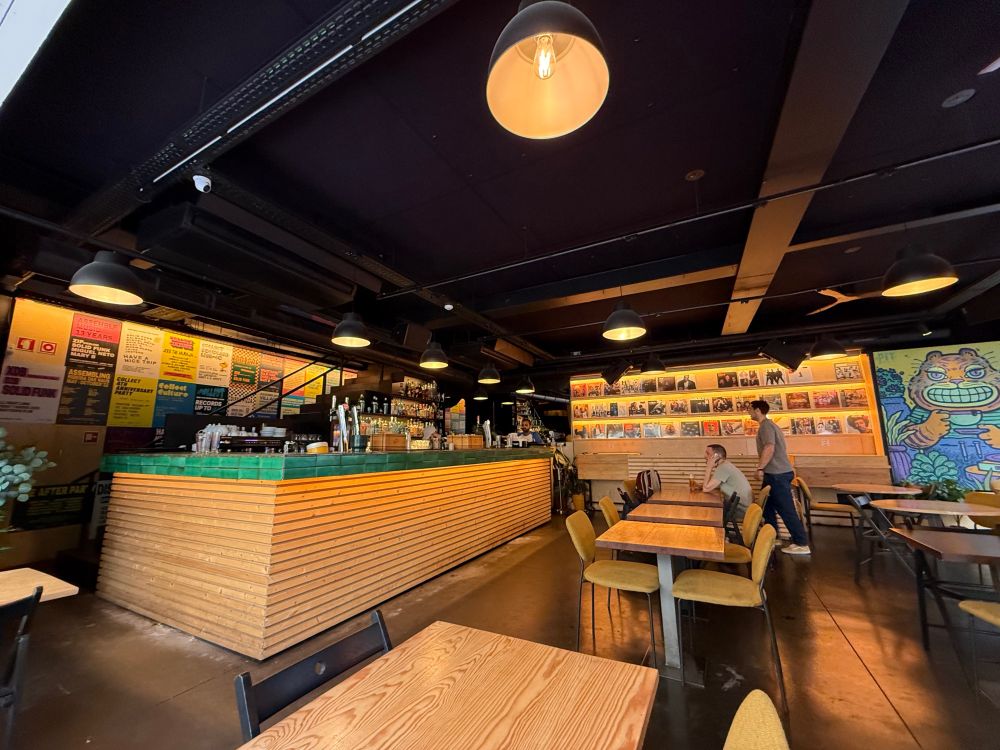 Bar interior with record albums adorning the walls.