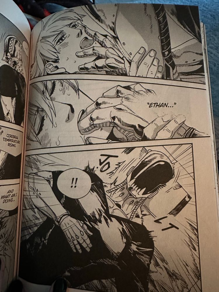 Manga panels of cyborg man sticking his fingers in the human man’s mouth sensually and then waking from a dream