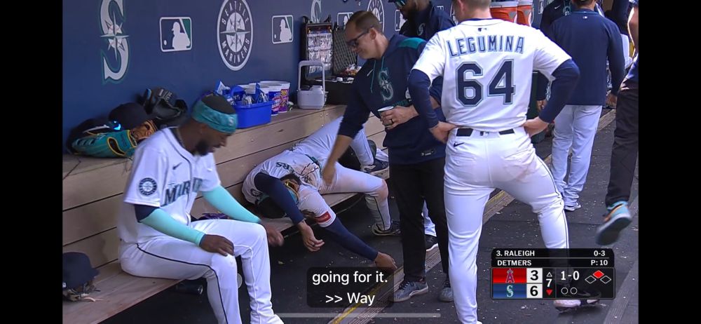 JP Crawford tired after running and laying down in the dugout