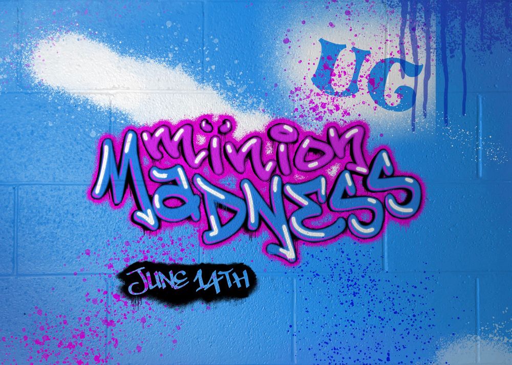 White, pink, and blue spray paint graffiti on a blue cinderblock background reading “UC minion MADNESS June 14th”