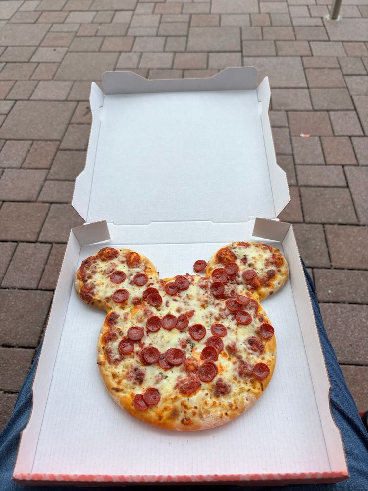 A Mickey or Minni Mouse shaped pizza 