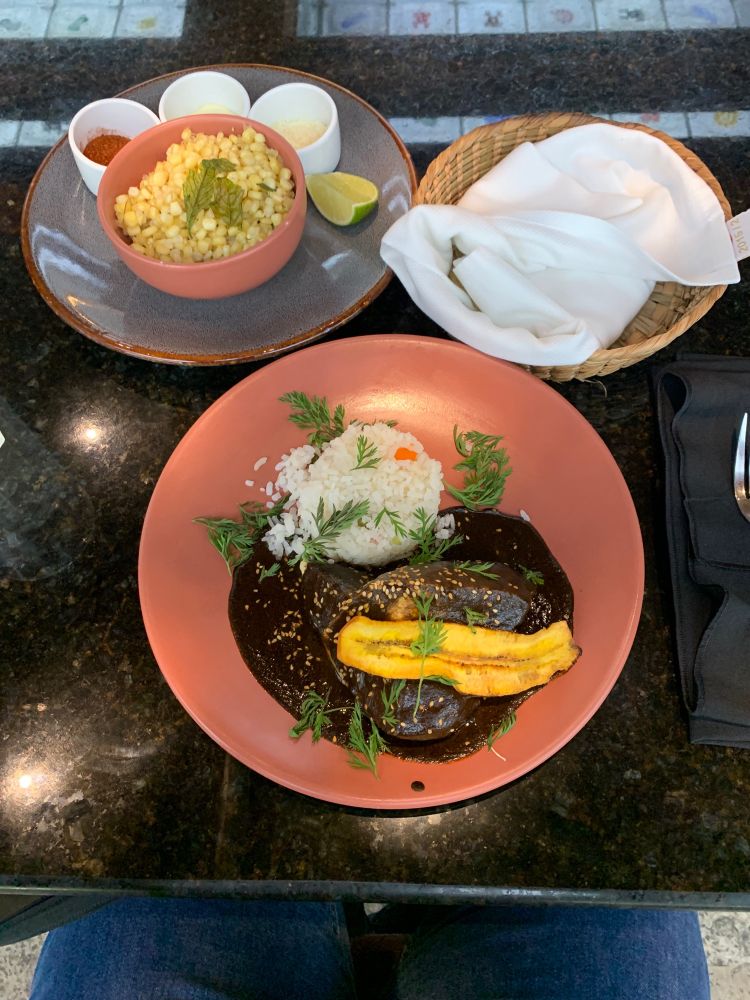 Lunch in the restaurant at the museum, chicken with molé, plantain and rice, street corn and tortillas.