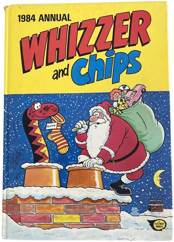 The cover of the 1984 comics annual WHIZZER AND CHIPS featuring Father Christmas being surprised on the roof of a house by Sid's Snake popping up from the chimney with his own Christmas stocking.