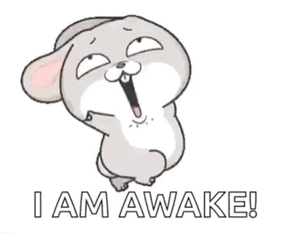 a cartoon rabbit with its mouth open and the words `` i am awake '' written below it .