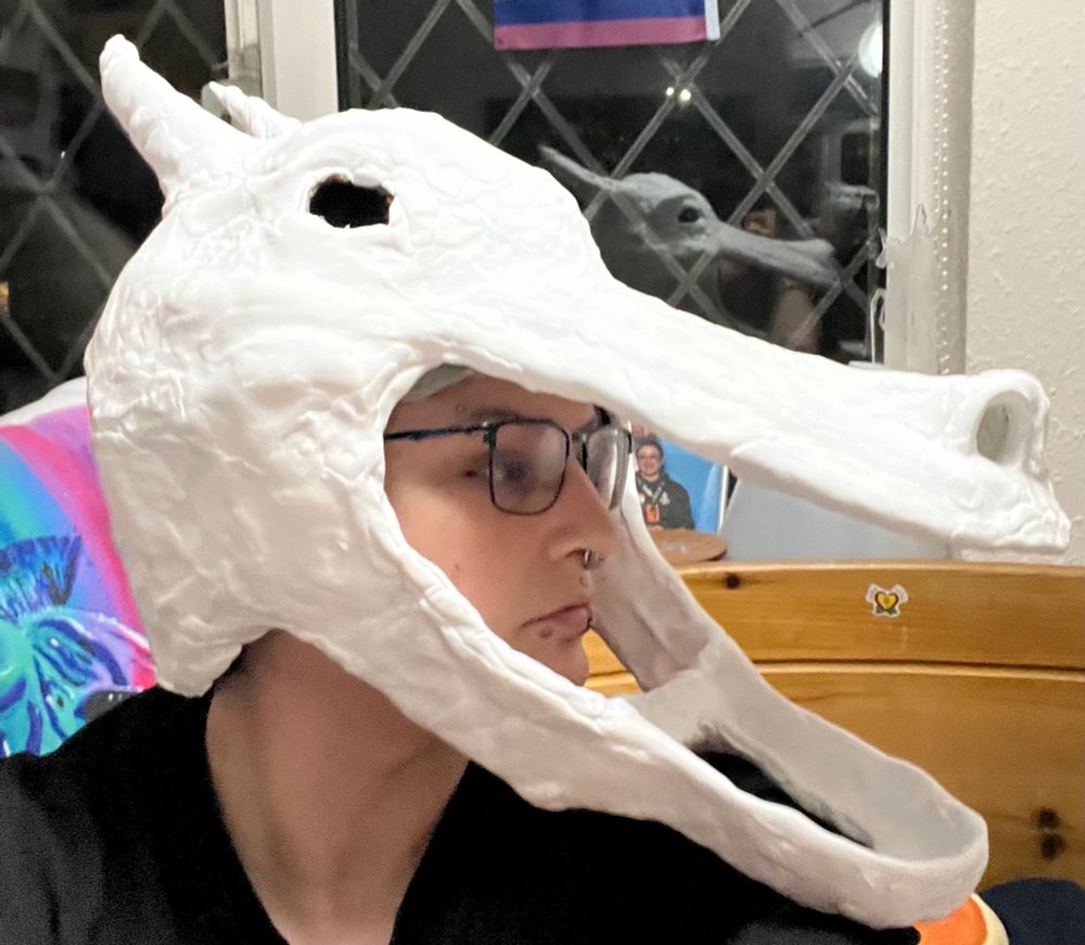 A white Kobold mask side view