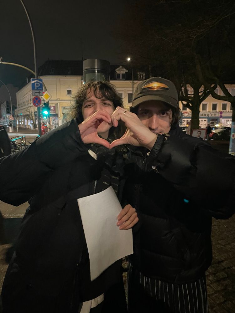 me and porter, doing half a heart sign each
