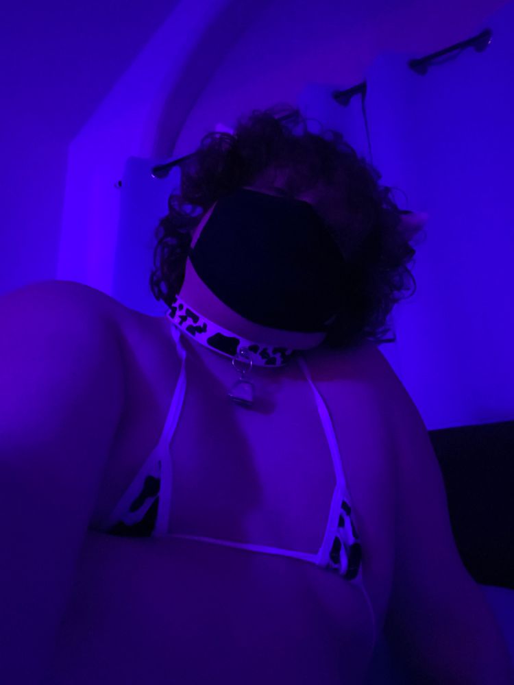 Slutty cow in a micro bikini looking down on you 