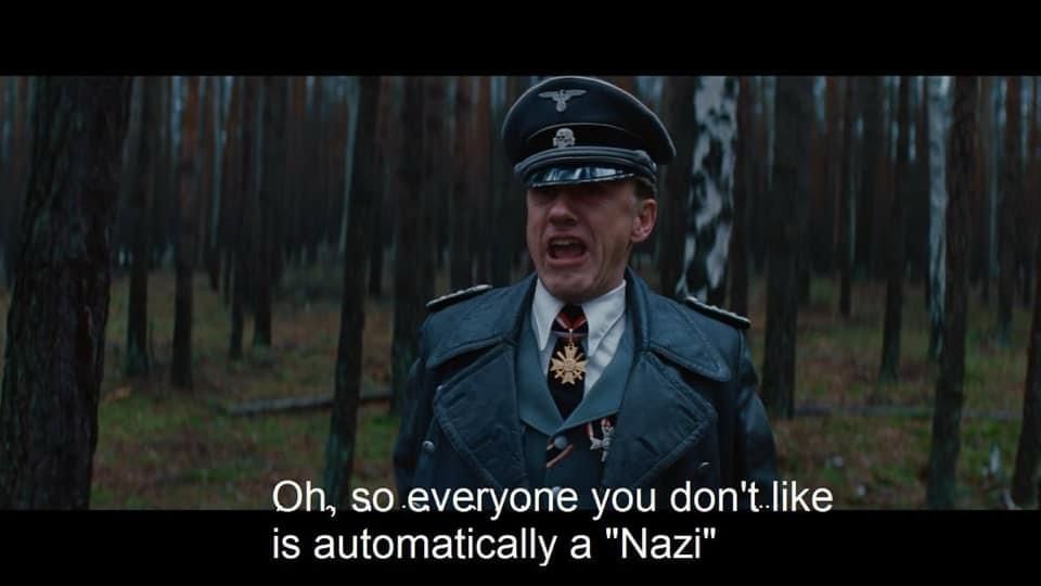 Col Hanz Landa of the Nazi Army in full Nazi regalia saying “oh, so everyone you don’t like is automatically a “Nazi””