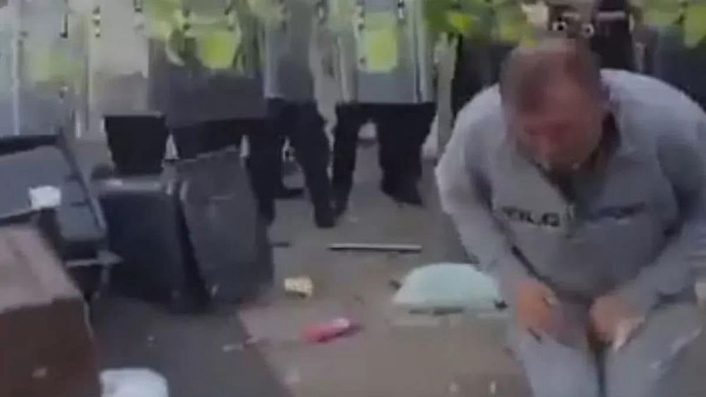 The silly racist is doubled over grabbing his bruised and hopefully ruptured genitals 
