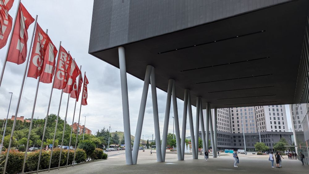 Entrance of the BCE building where the conference was held. Red flags on the left