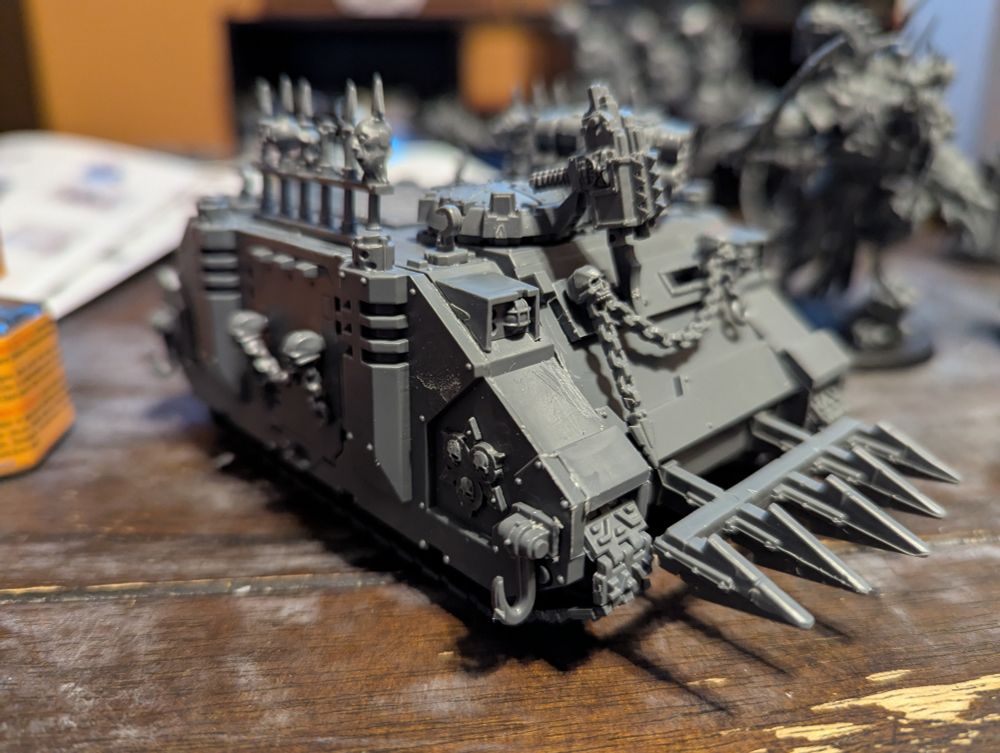 Chaos Rhino model w/ Nurgle iconography from Warhammer 40k table top miniatures game. Lots of spikey bits.