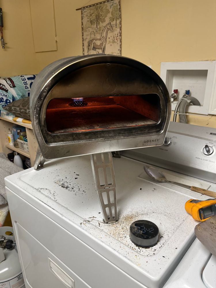 Pizza oven atop a clothes dryer 
