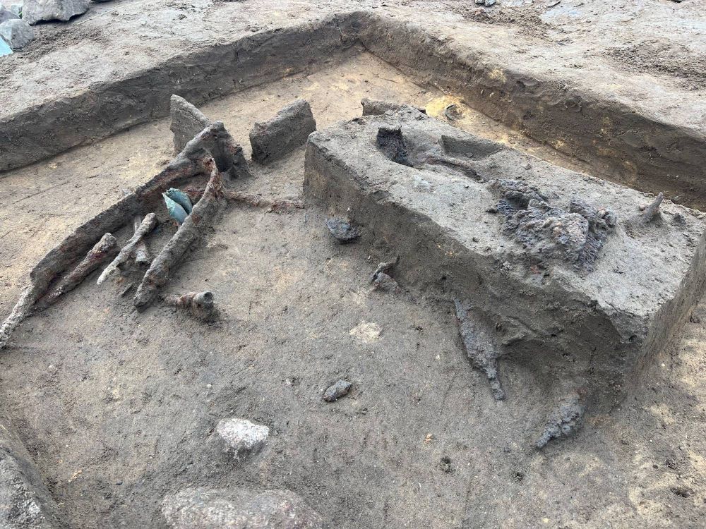 A photo taken during the excavation, showing weapons