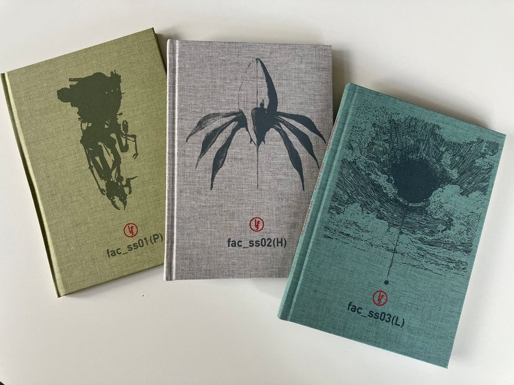 Three hardcover books with weird covers