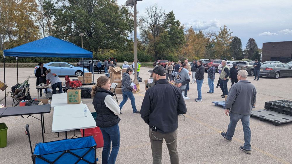 Food drive at UFCW Local 655 wrapping up this afternoon. You can still see a canopy and lots of tables as well as pallets for food and a stack of boxes of food. Around 30 donors, volunteers, and candidates are spread out throughout the picture working.

Among the candidates who came out to help were: Claire Heinrich, Doug Beck, Fred Wellman, Mark Boyko, Mark Osmack, Gina Mitten, Rachel Proudie, Chris Clark, Nicole Greer, John Bowman, and many others.