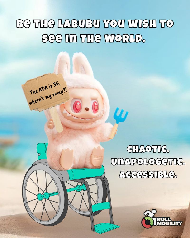 A pink Labubu figure with red eyes in a teal wheelchair at the beach holding a sign that reads, "The ADA is 35, where's my ramp?!" in one hand and a sand fork in the other with text: "Be the Labubu you wish to see in the world. Chaotic. Unapologetic. Accessible." Roll Mobility logo at the bottom.