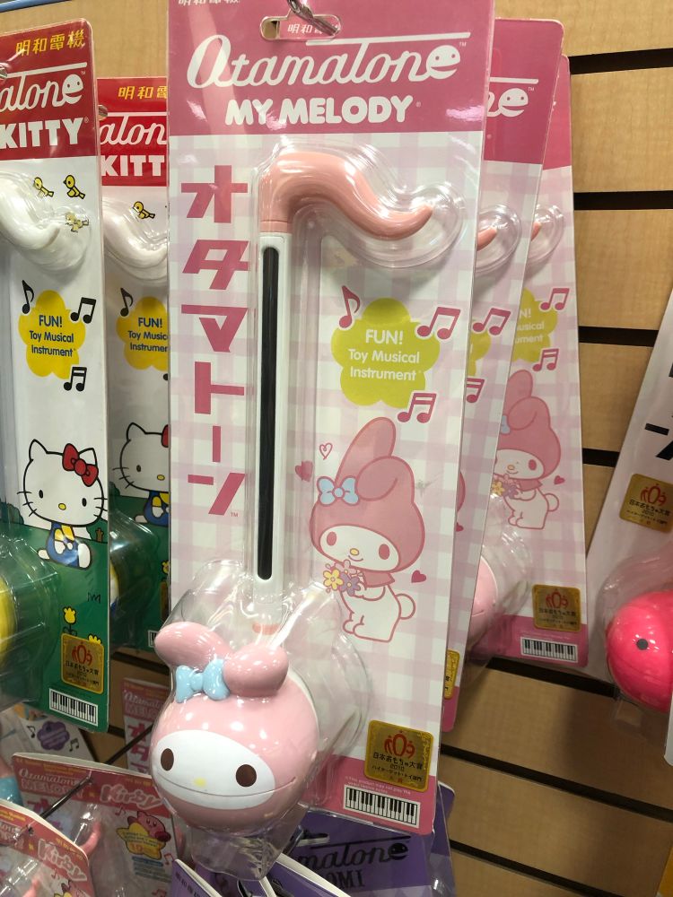 An Otamatone musical toy styled after My Melody.