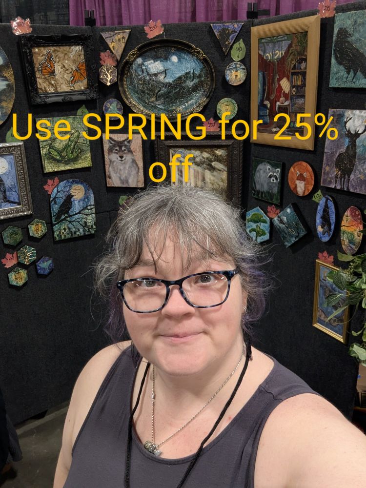 Wall of paintings behind artist in grey top. This weekend only, use SPRING  for 25 % off amybdart.com #art #painting #sale