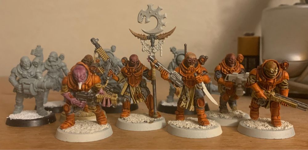 WIP miniatures, assembled but only half painted.