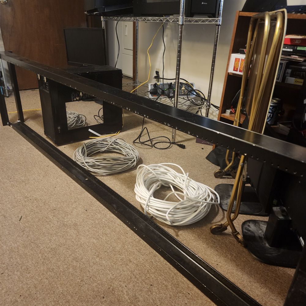 50(?) ft of Cat5e cable and 50(?) ft of coax cables both rolled up into their own individual bundles.