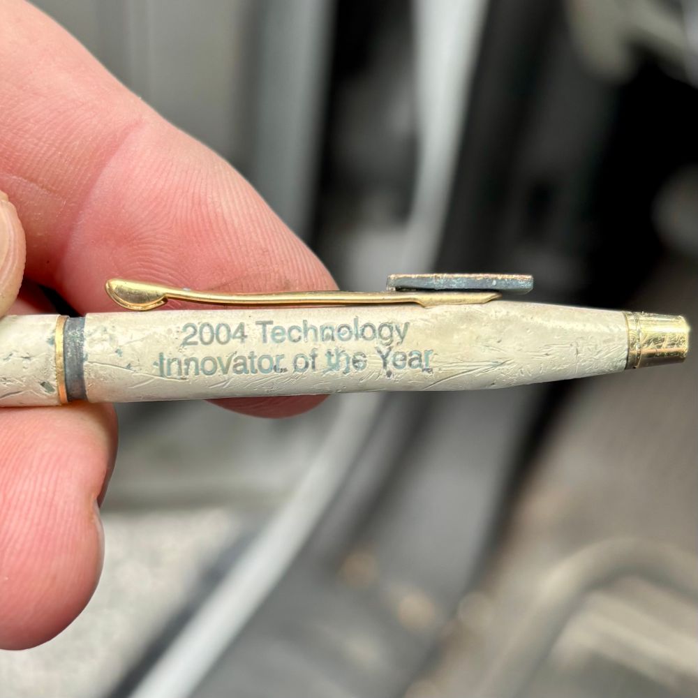 Crushed, old swag pen. “2004 Technology Innovator of the Year” 