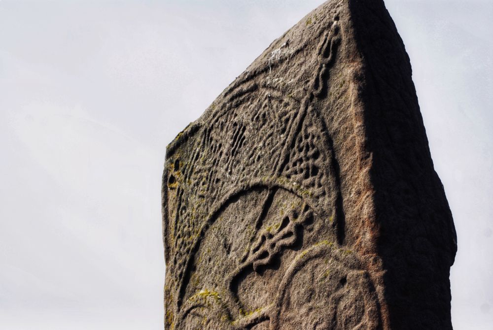 The crescent and vrod on the other face of Aberlemno Roadside crossslab. This is filled with key pattern and interlace.