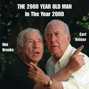 Album cover of The 2000 Year Old Man in the Year 2000. Mel Brooks, left, and Carl Reiner are looking out and pointing in opposite directions with Reiner’s left arm crossed in front of Brooks’s right arm.