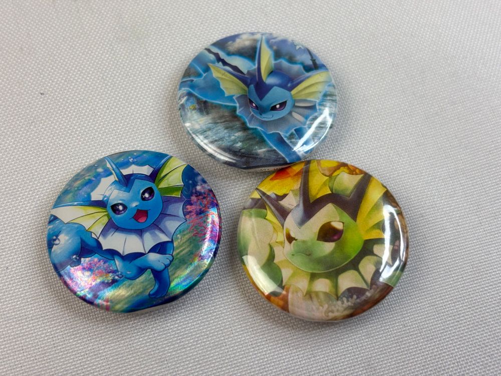 3 vaporeon button badges made from Pokemon cards