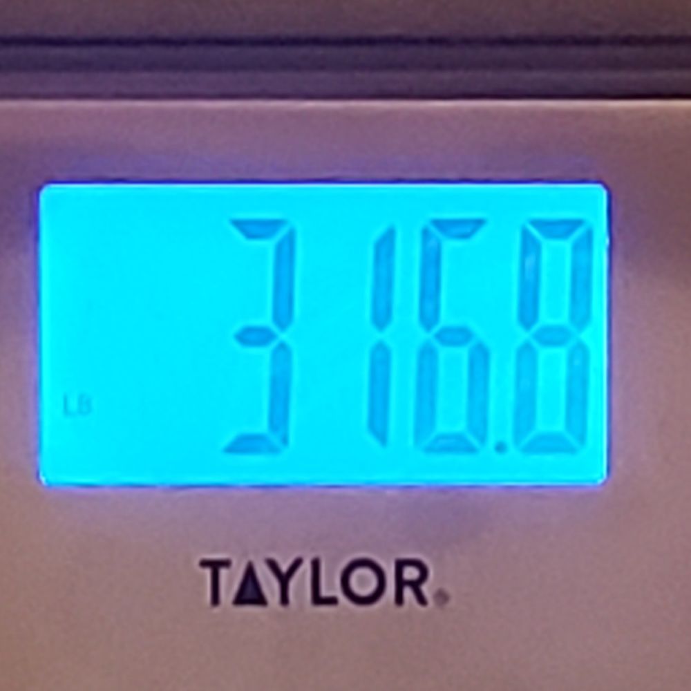 A scale reading 316.8lbs