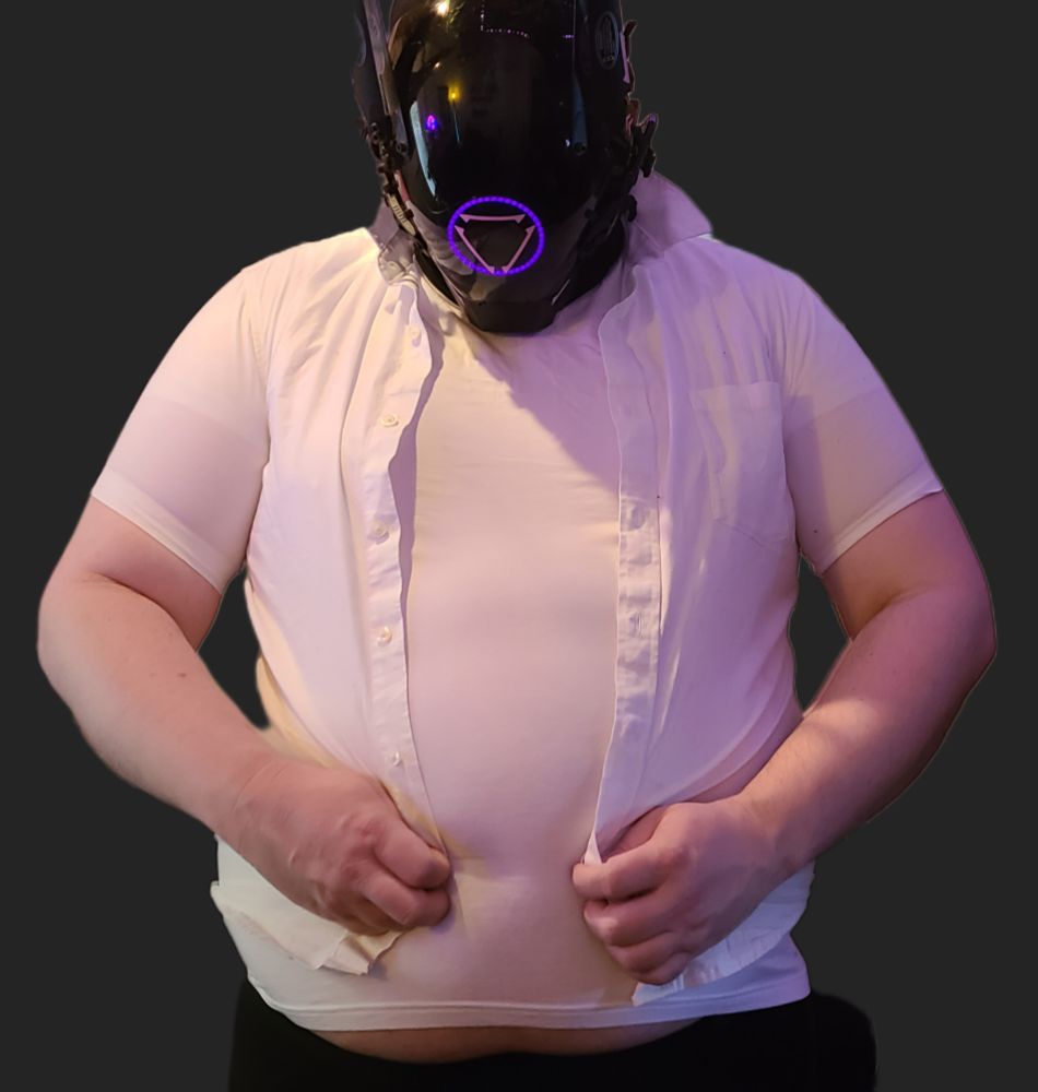 Robogut attempting to button its shirt
