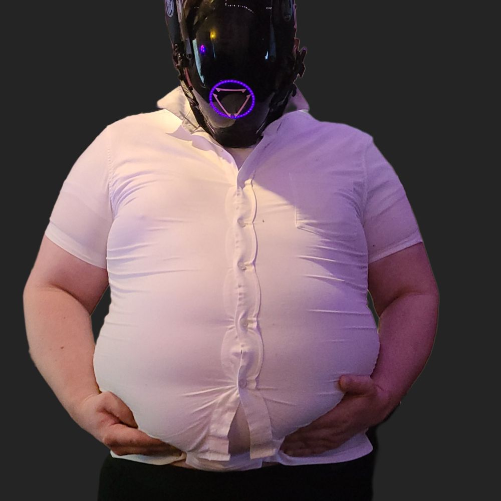 Robogut holding its belly, wearing a shirt with strained buttons 