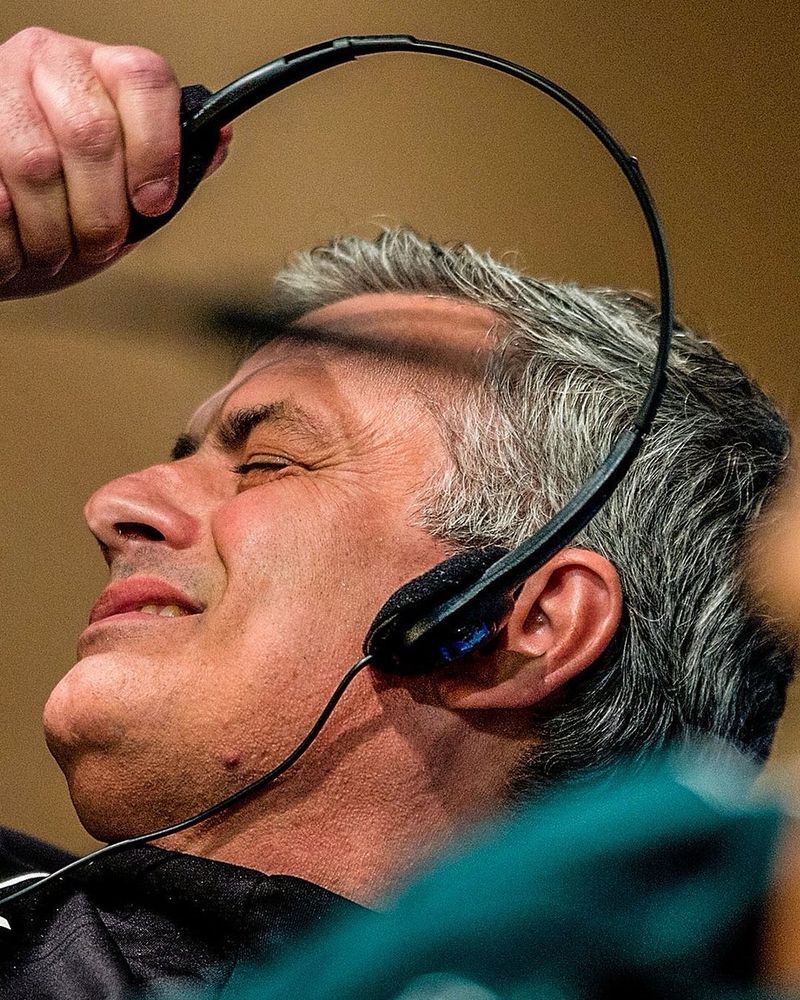Jose Mourinho taking off headphones in disgust