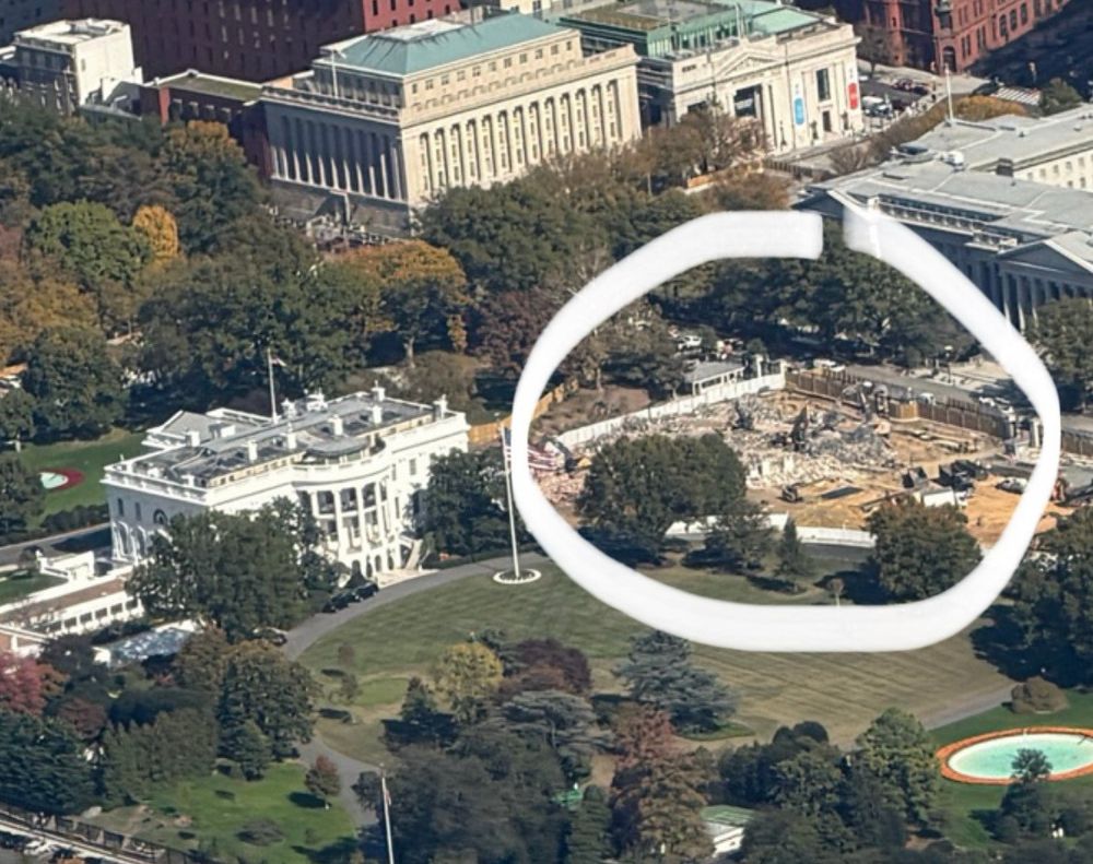 A higher altitude photo showing the White House with the East Wing in rubble, circled in white