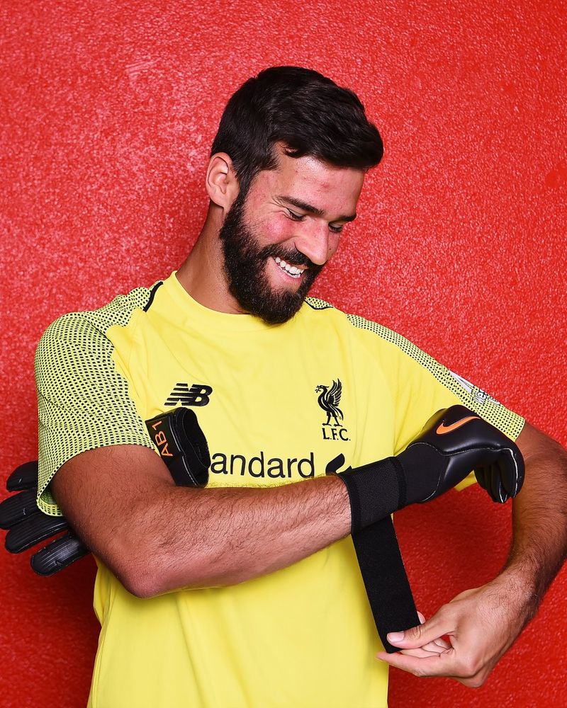 Alisson on his signing day.