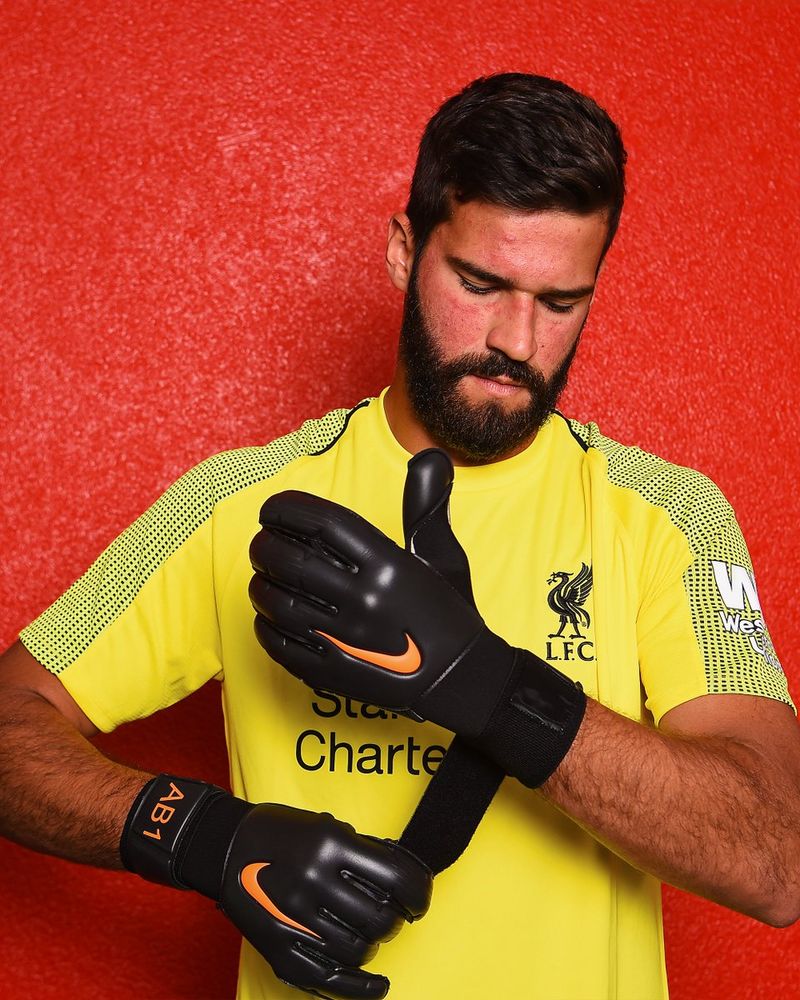 Alisson on his signing day.