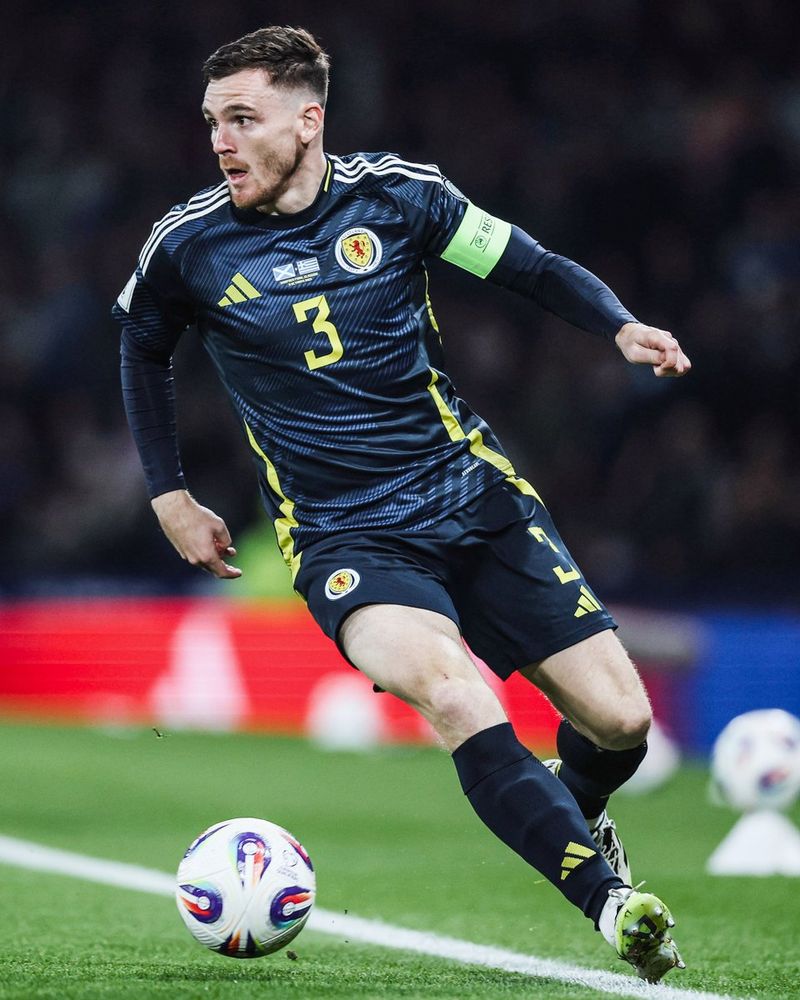 Andrew Robertson with the ball for Scotland against Greece