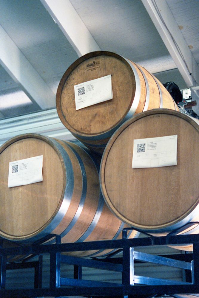 Barrels of aging alcohol stacked to the ceiling at Hanalei Spirits Distillery.  