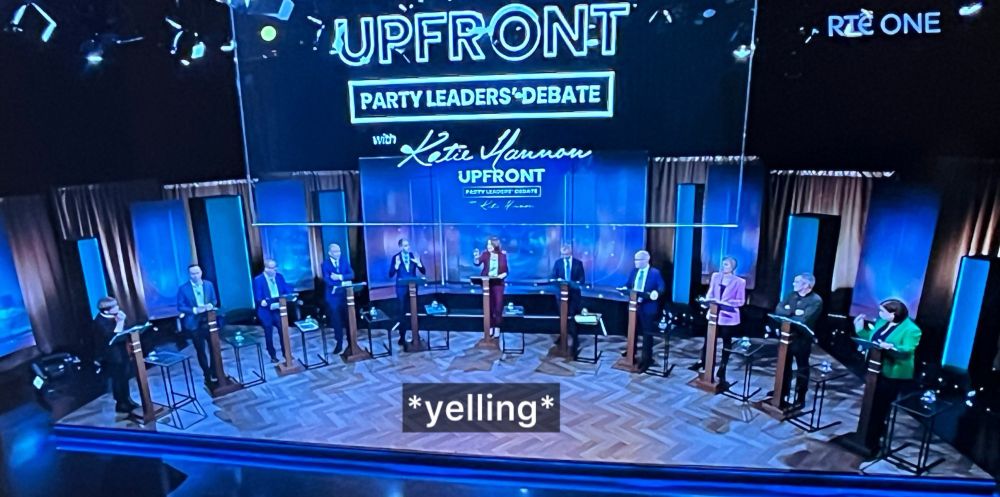 A screenshot of the UpFront debate with a subtitle that says *yelling*
