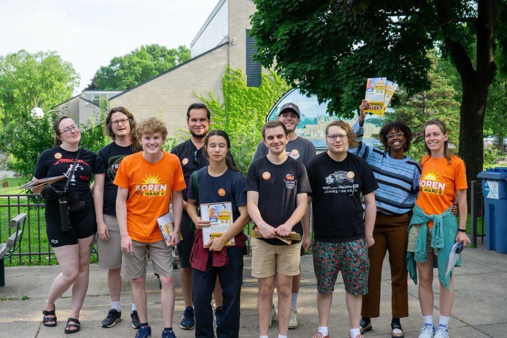Group of volunteers with Soren with Ward 8 campaign shirts and buttons