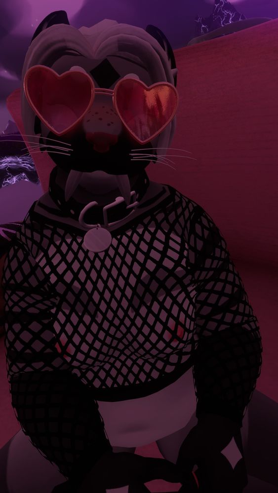 Articus is in a bit more of a risque look here. Their hair is pulled up into a ponytail with pulled back bangs. Their glasses are now heart shaped with pink lenses. They are wearing a fishnet top here, hiding very little and even lets the viewer see her nipples.
