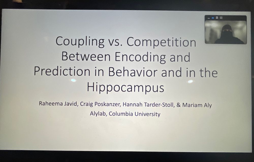 A computer slide reads “Coupling vs Competition Between Encoding and Prediction in Behavior and in the Hippocampus” as the title followed by the subtitle “Raheema Javid, Craig Poskanzer, Hannah Tarder-Stoll, & Mariam Aly.” The next line reads “Alylab, Columbia University.” On the right hand top corner of the screen is a small rectangle with Raheema’s live zoom feed.