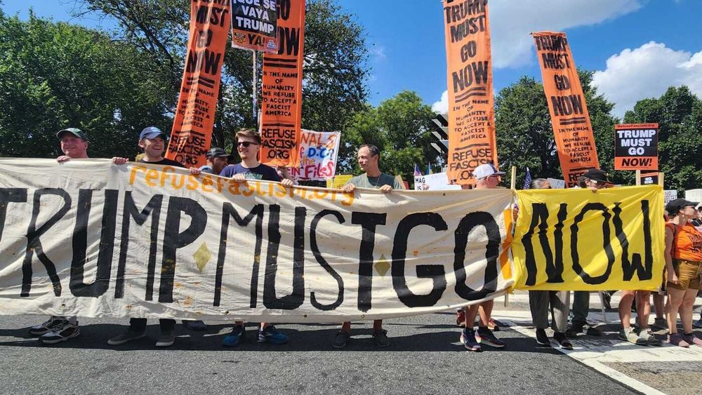 Protesters marched to the White House on Saturday as D.C. Metropolitan Police officers and National Park Service police looked on from a distance.
